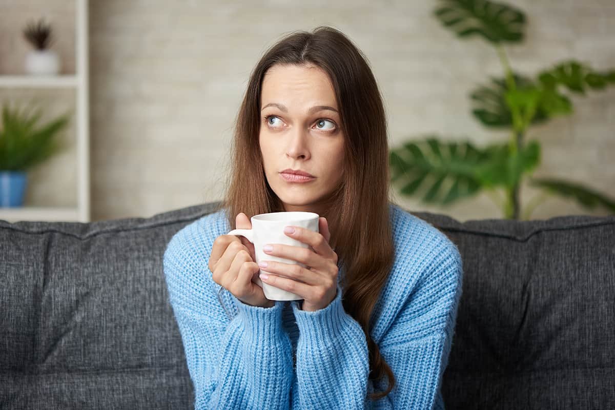 woman drinking coffee as part of life in recovery